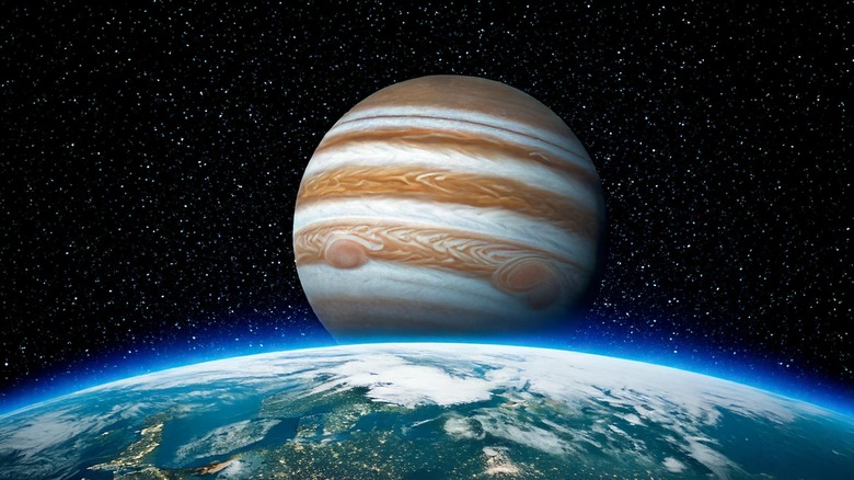 Earth in the foreground with Jupiter in the background
