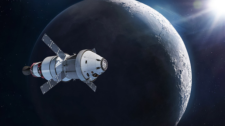 The Orion spacecraft orbiting the moon.
