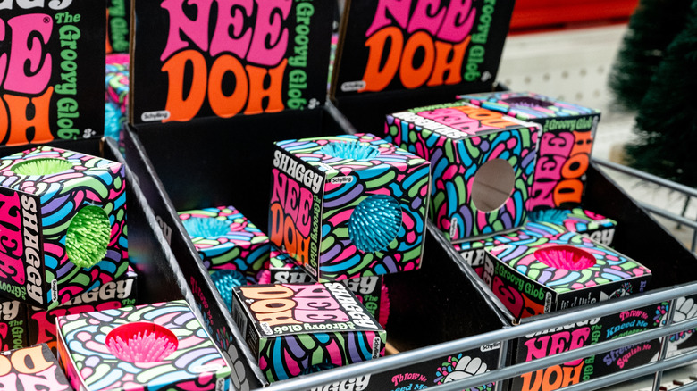 Store display for Need Doh Groovy Glob, a hand-sized stress ball