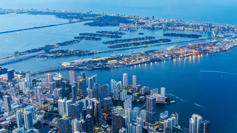 Aerial view of Miami showing skyscrapers in downtown surrounded by water