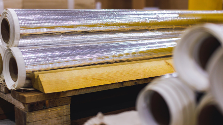 Large sheets of aluminum foil in a warehouse