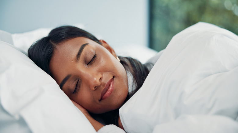 Woman sleeping in bed