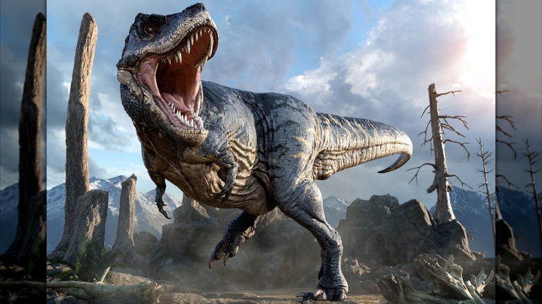 Illustration of a T. rex in a barren landscape with rocks and dying trees with mountains in the background