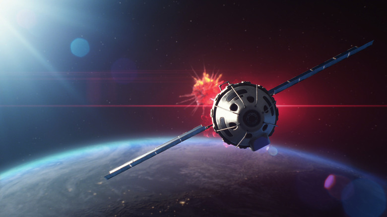 CGI satellite in orbit above earth with fiery red explosion in background