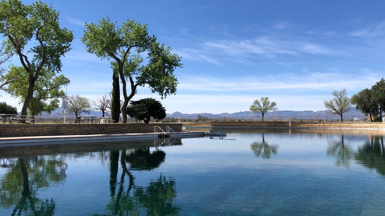 Balmorhea Swimming Pool is seen beneath a clear blue sky