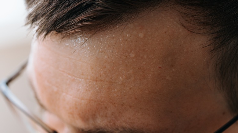 Close up of a man's forehead