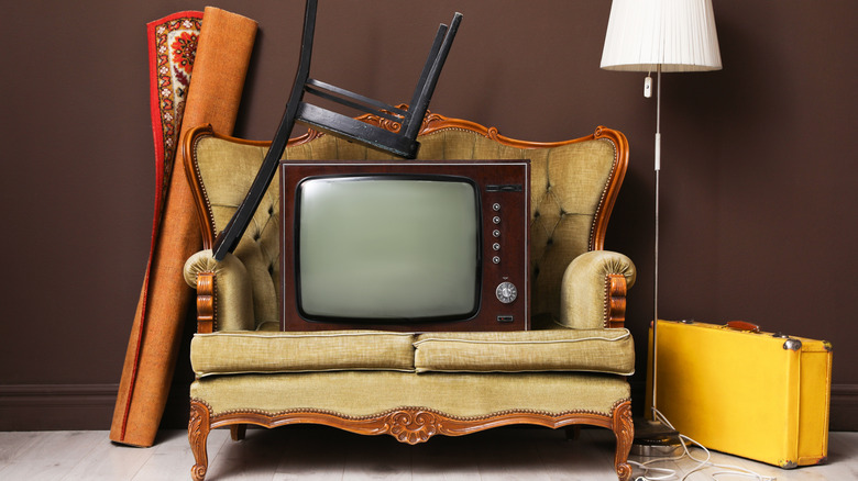 Retro tv on an old sofa