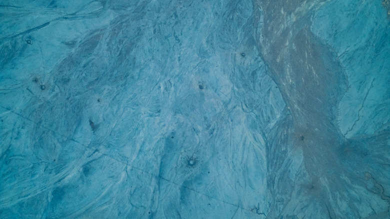 An aerial view of frozen ground.