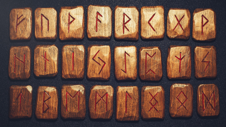 Elder Futhark runes carved in wood