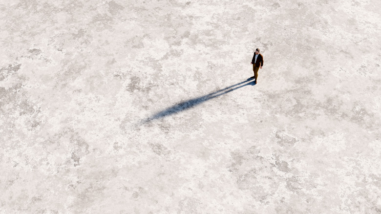 Lone man in a desolate area.