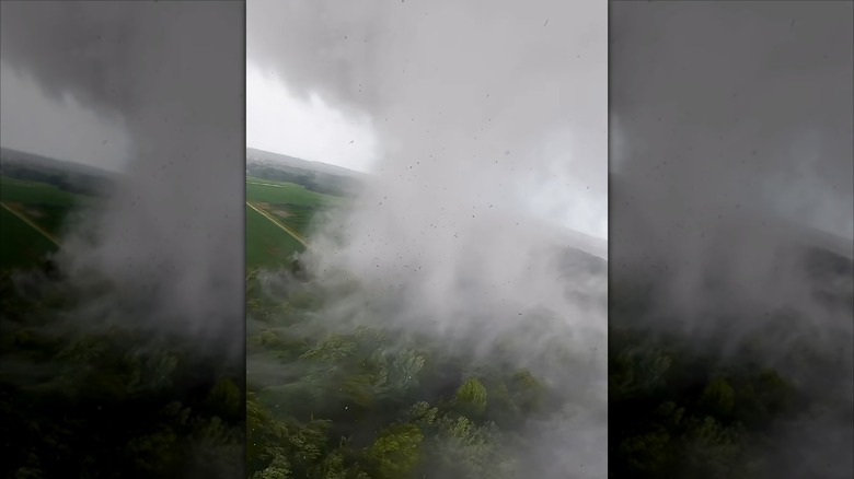OTUS Project drone approaching a tornado just as it's fully forming over a patch of trees
