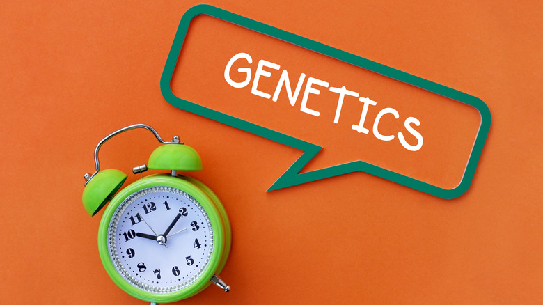Picture of an alarm clock with a speech bubble saying "GENETICS"