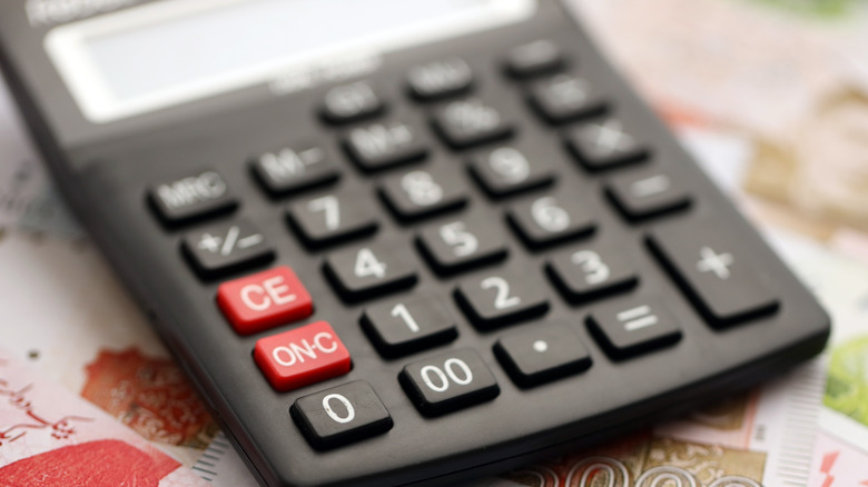 Closeup of a calculator with the focus on the ON key