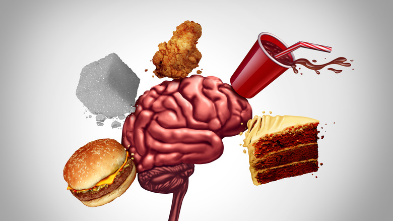 A graphic of a brain surrounded by sugar cube, fried foods, and soda