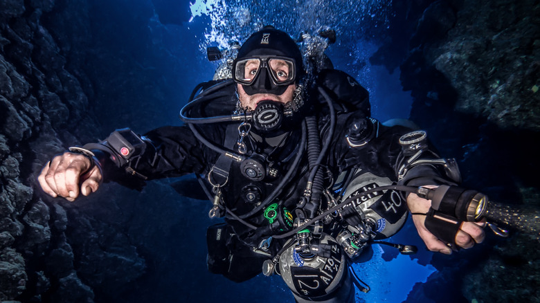 Close-up of a technical diver in an underwater canyon