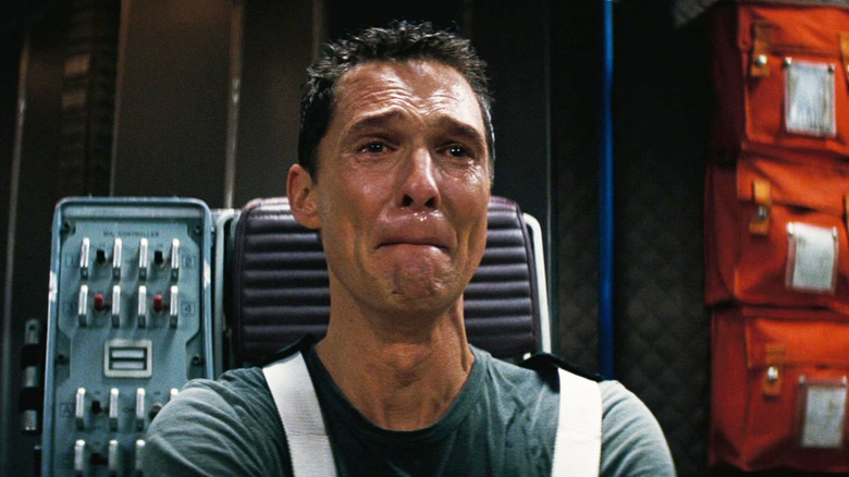 Matthew McConaughey's Coop cries in a space shuttle in Interstellar