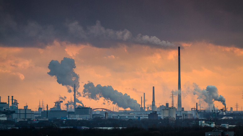 large factory spewing smoke