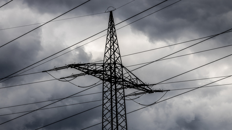 power line tower with foreboding sky