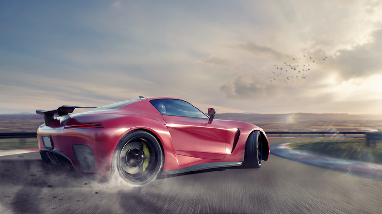 A rendering of a sports car drifting around a turn