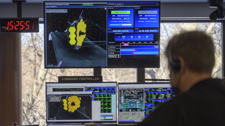 Monitors display controls for the James Webb Space Telescope