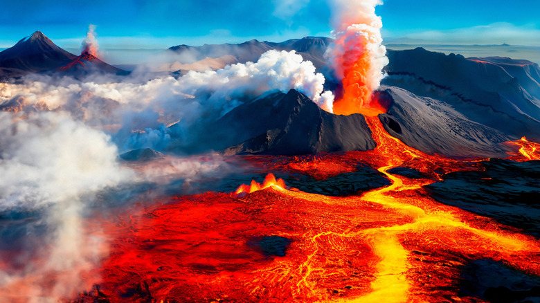 Volcanic eruption with lots of lava and billowing smoke