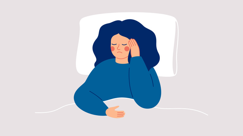 A vector illustration of a woman sleeping on a pillow with her hand pressed to her head.