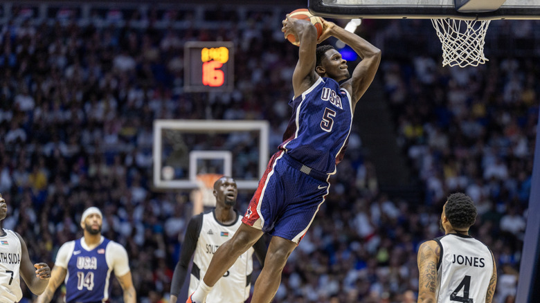 Anthony Edwards mid-air while dunking during the Paris Olympics