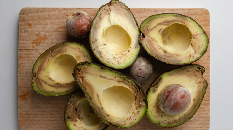 Pile of avocados turning brown