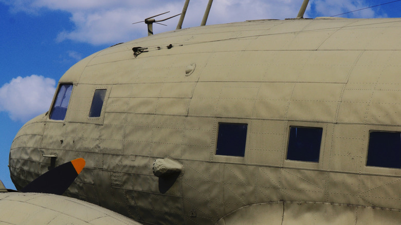 Old military retro plane with square windows