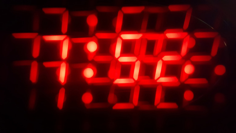Digital clock with blurred red digits