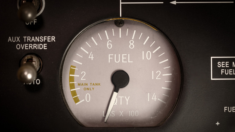 Fuel gauge on aircraft showing empty