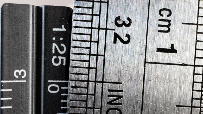 Two rulers side-by-side showing different measurements