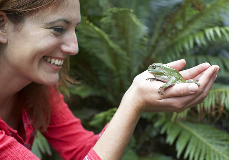 Woman holding frog