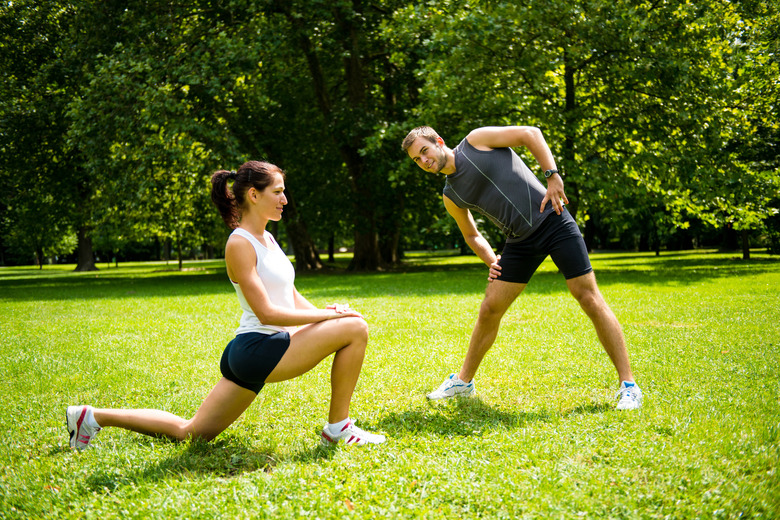 Warm up - couple exercising before jogging