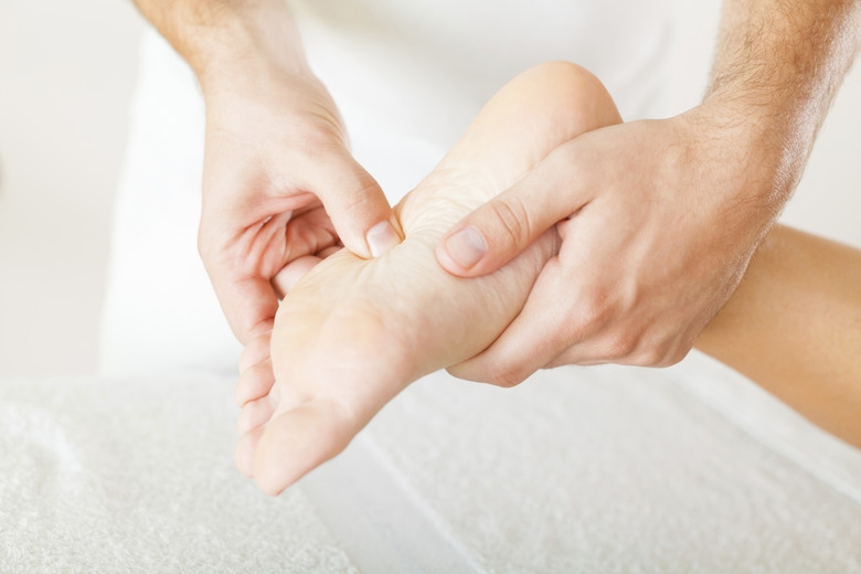 Foot massage in the spa salon