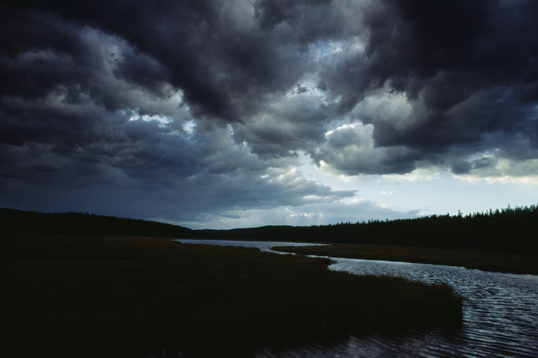 Ominous rainclouds over landscape, Alberta, Canada